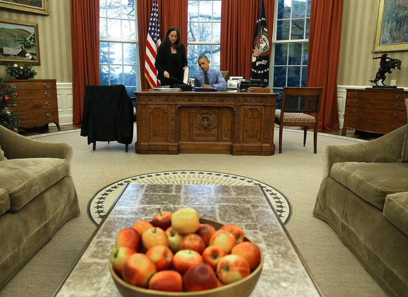 Here is the table watching Obama work. Image via Getty.